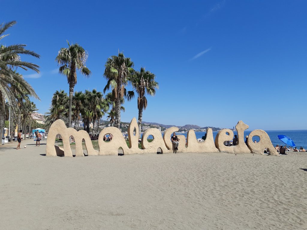 Malaga Spain - beach and sign of Malagueta